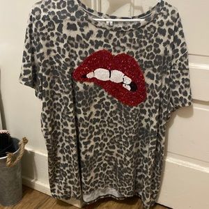 This is a cute lip/cheetah print shirt!.